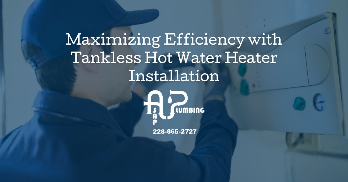 Plumber completing tankless water heater installation in Gulfport MS home